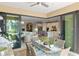 Outdoor dining area with access to the kitchen and living room at 5639 Rain Lily Ct, Sarasota, FL 34238