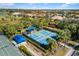 Community pickleball courts with shade structures at 5639 Rain Lily Ct, Sarasota, FL 34238