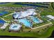 Resort-style community with pools, clubhouse, and sports courts at 5429 Mystic Water Cv, Bradenton, FL 34211