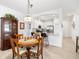 Bright dining area adjacent to kitchen and living room at 5429 Mystic Water Cv, Bradenton, FL 34211