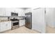 Modern kitchen with stainless steel appliances and granite countertops at 5429 Mystic Water Cv, Bradenton, FL 34211