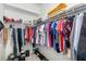 Large walk-in closet with ample shelving and hanging space at 5429 Mystic Water Cv, Bradenton, FL 34211