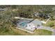 The home includes a delightful screened-in pool, perfect for enjoying sunny days at 5441 18Th W Ct, Bradenton, FL 34207