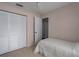 Simple bedroom with a closet and tiled flooring at 5441 18Th W Ct, Bradenton, FL 34207
