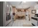 Eat-in kitchen with stainless steel appliances and tiled floors at 5441 18Th W Ct, Bradenton, FL 34207