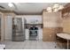 Modern kitchen with stainless steel appliances and ample counter space for cooking at 5441 18Th W Ct, Bradenton, FL 34207