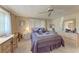 Bedroom with desk area, dresser, and a comfortable chair at 5619 Bayshore Rd # 410, Palmetto, FL 34221