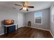 Bedroom with a TV on a desk and a window view at 5809 71St E St, Palmetto, FL 34221