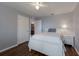 Bedroom with a white bed and a view into the bathroom at 5809 71St E St, Palmetto, FL 34221