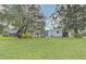 Charming single-story home with mature trees and a well-maintained lawn at 6517 Approach Rd # 57, Sarasota, FL 34238