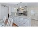 Updated kitchen with granite countertops, stainless steel appliances, and plenty of storage at 6517 Approach Rd # 57, Sarasota, FL 34238