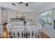 Dining area next to kitchen with hardwood floors and view of the kitchen's layout at 6517 Approach Rd # 57, Sarasota, FL 34238