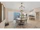 Casual dining area with round table and chairs, near the kitchen at 7742 Silver Bell Dr, Sarasota, FL 34241