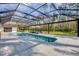 Spacious pool with screened enclosure and patio at 7742 Silver Bell Dr, Sarasota, FL 34241