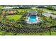 Resort-style pool with surrounding patio and landscaping at 8465 Skye Ranch Blvd, Sarasota, FL 34241