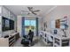 Versatile bonus room with workspace and media area at 8548 Snowfall St, Sarasota, FL 34241