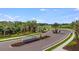Cassia at Skye Ranch entrance with lush landscaping at 8548 Snowfall St, Sarasota, FL 34241
