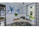 Bright home office with built-in shelving and large window at 8548 Snowfall St, Sarasota, FL 34241