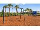 Playground with swings and play equipment at 8548 Snowfall St, Sarasota, FL 34241