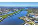 Scenic aerial view showing the extensive canal system and waterfront homes in this coastal community, close to the ocean at 907 Garland Ave, Nokomis, FL 34275
