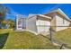 Spacious backyard with shed next to a screened-in lanai area, offering plenty of storage at 907 Garland Ave, Nokomis, FL 34275