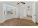 Bedroom boasts a bay window and an open doorway leading to an additional space at 907 Garland Ave, Nokomis, FL 34275