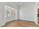 Bright dining room with hardwood floors and a large bay window for plenty of natural light at 907 Garland Ave, Nokomis, FL 34275