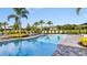 Inviting pool with plenty of lounge chairs at 9113 Night Skye Ave, Sarasota, FL 34241
