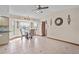 Inviting dining area features tile floors, a chandelier and windows providing plenty of natural light at 1058 Bounds St, Port Charlotte, FL 33952