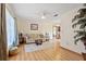 Bright living room featuring hardwood floors and a ceiling fan at 1058 Bounds St, Port Charlotte, FL 33952