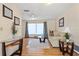 Cozy living room with hardwood floors, a comfortable sofa, and ample natural light at 1058 Bounds St, Port Charlotte, FL 33952
