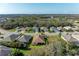 An aerial view of several houses in the neighborhood, showing the tree coverage and neighborhood layout at 12514 Goldenrod Ave, Bradenton, FL 34212