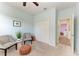 Relaxing room with a closet, neutral carpet, and two comfortable chairs in a calming space at 12514 Goldenrod Ave, Bradenton, FL 34212