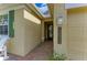 Close-up of the home's entrance, showing the front door and address at 12514 Goldenrod Ave, Bradenton, FL 34212