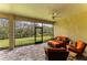 Inviting screened-in patio with brick pavers and comfortable seating, perfect for relaxing outdoors at 12514 Goldenrod Ave, Bradenton, FL 34212