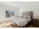 Inviting bedroom with a large window, providing natural light and outdoor views at 13315 Palmers Creek Ter, Lakewood Ranch, FL 34202