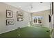Fun bonus room with a putting green for golf enthusiasts at 13315 Palmers Creek Ter, Lakewood Ranch, FL 34202