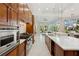 Spacious kitchen with marble countertops, custom cabinets and stainless steel appliances at 13315 Palmers Creek Ter, Lakewood Ranch, FL 34202