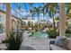 Beautiful enclosed pool area with tropical plants, comfortable seating, and lots of space at 13315 Palmers Creek Ter, Lakewood Ranch, FL 34202