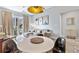 Comfortable living room with balcony access, modern décor, adjacent to the kitchen at 1500 State St # 305, Sarasota, FL 34236