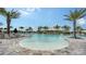 Community pool area with shallow entry, seating, and Bahama Bar poolside at 15115 Montello Way, Lakewood Ranch, FL 34211
