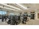 Bright and spacious fitness center with state-of-the-art equipment, large mirrors, and scenic views from the expansive windows at 15115 Montello Way, Lakewood Ranch, FL 34211