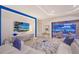 Bright living room featuring modern decor, a comfortable sofa, and access to the outdoor living space at 15115 Montello Way, Lakewood Ranch, FL 34211