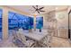 Covered outdoor kitchen and dining area overlooking the golf course at 15115 Montello Way, Lakewood Ranch, FL 34211