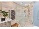 Bathroom features a glass walk-in shower and a grey vanity at 1771 Ringling Blvd # 703, Sarasota, FL 34236
