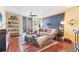 Comfortable living room featuring modern decor, sliding glass doors, and hardwood floors at 1771 Ringling Blvd # 703, Sarasota, FL 34236