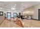 Elegant lobby features marble floors, stylish seating, and contemporary lighting, creating a welcoming atmosphere at 1771 Ringling Blvd # 703, Sarasota, FL 34236