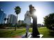 Black and white statue by the waterfront with skyscrapers in the background at 1771 Ringling Blvd # 703, Sarasota, FL 34236