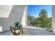 Balcony with table and chairs offers an ideal space to enjoy the natural outdoor view at 211 Cosmopolitan Ct # 211, Sarasota, FL 34236