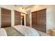 A serene bedroom features ample closet space, and is complete with an ensuite bathroom at 211 Cosmopolitan Ct # 211, Sarasota, FL 34236